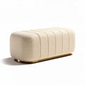 Textured cream upholstered ottoman with gold metal base 120 x 60 x 45cm
